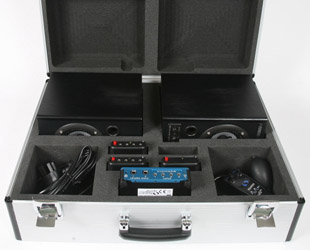 Open case showing Ensemble equipment & speakers